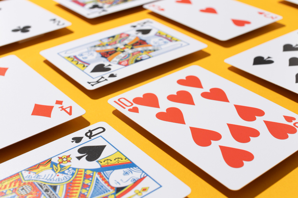 Playing cards on yellow background